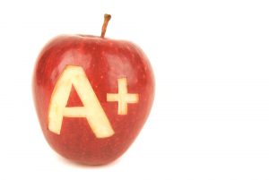 Photo of red apple with A+ on it